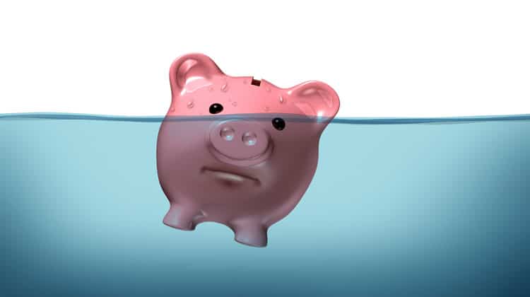 how to avoid debt piggy bank sinking
