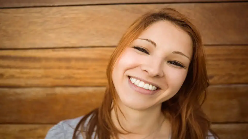 redhead woman smiling