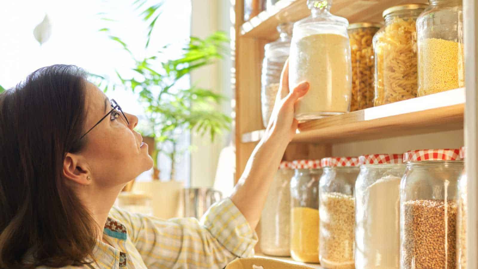 Woman in kitchen pantry