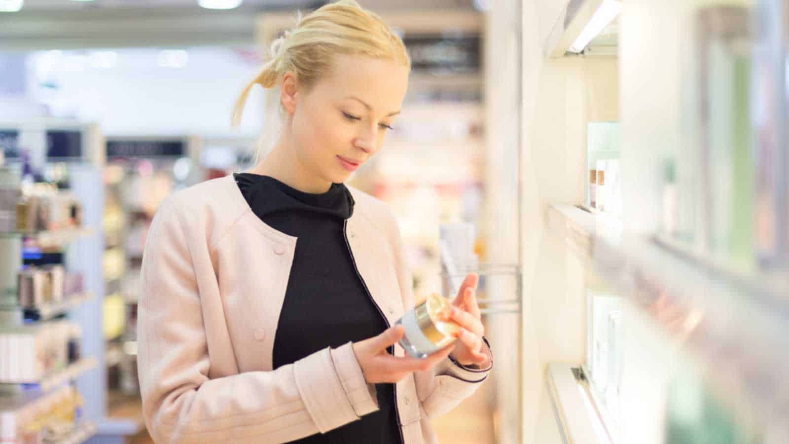 Woman purchasing perfume