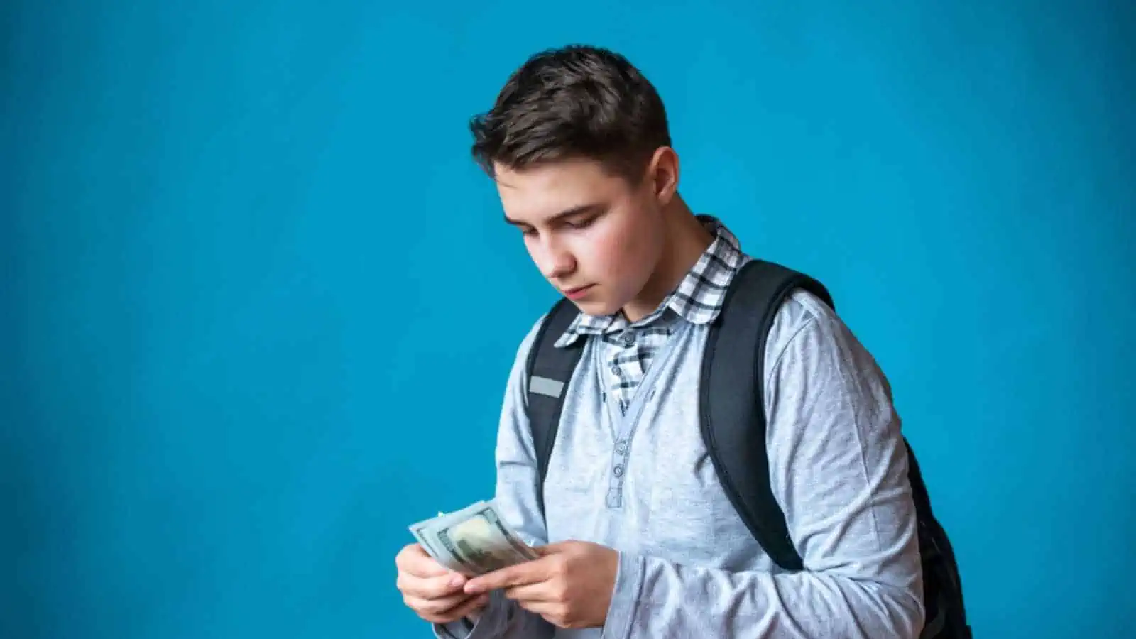 Young Man counting money
