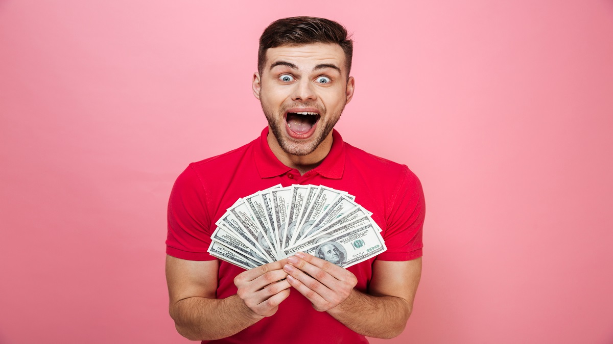 excited man with money