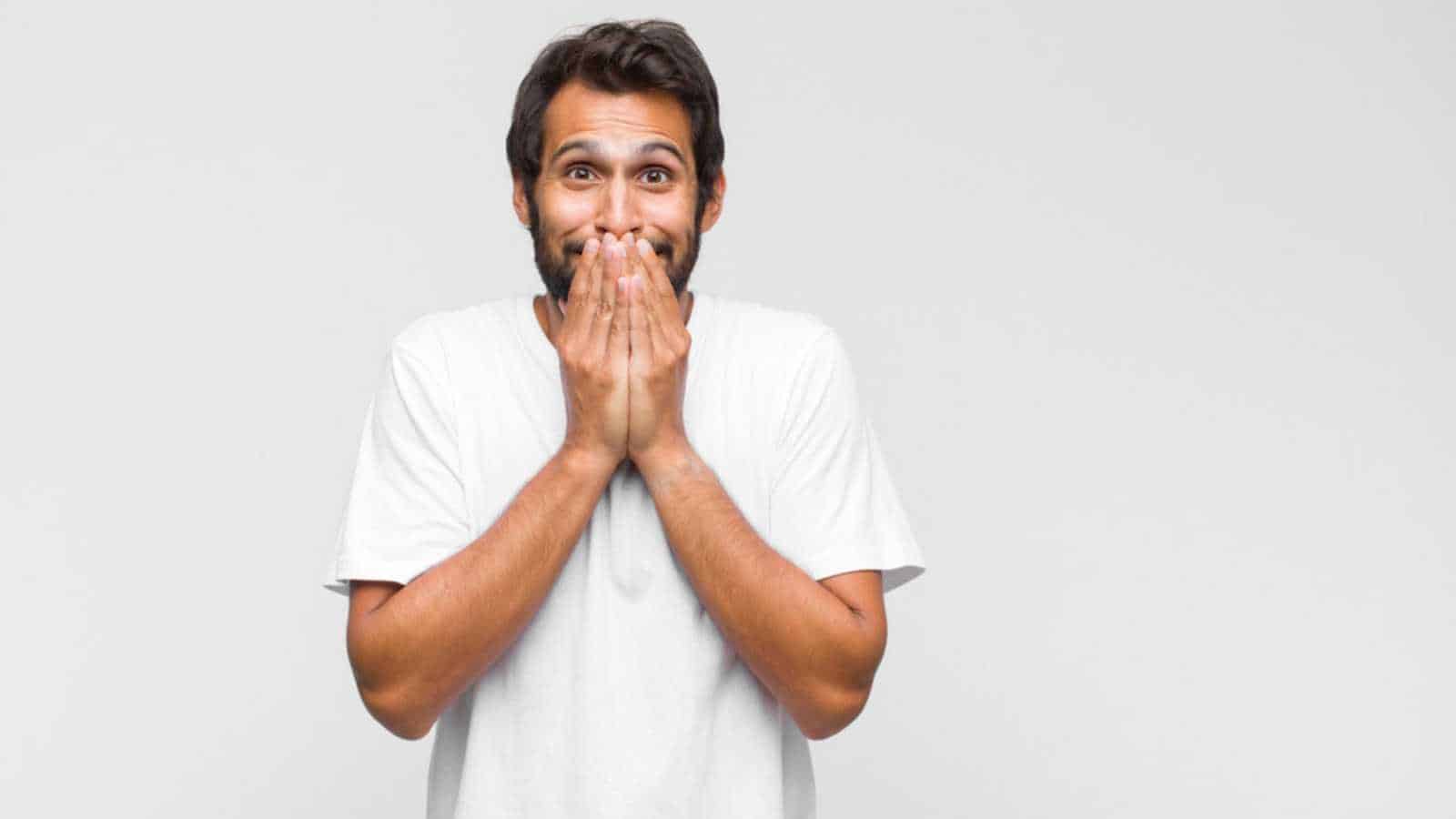 Man shocked and laughing