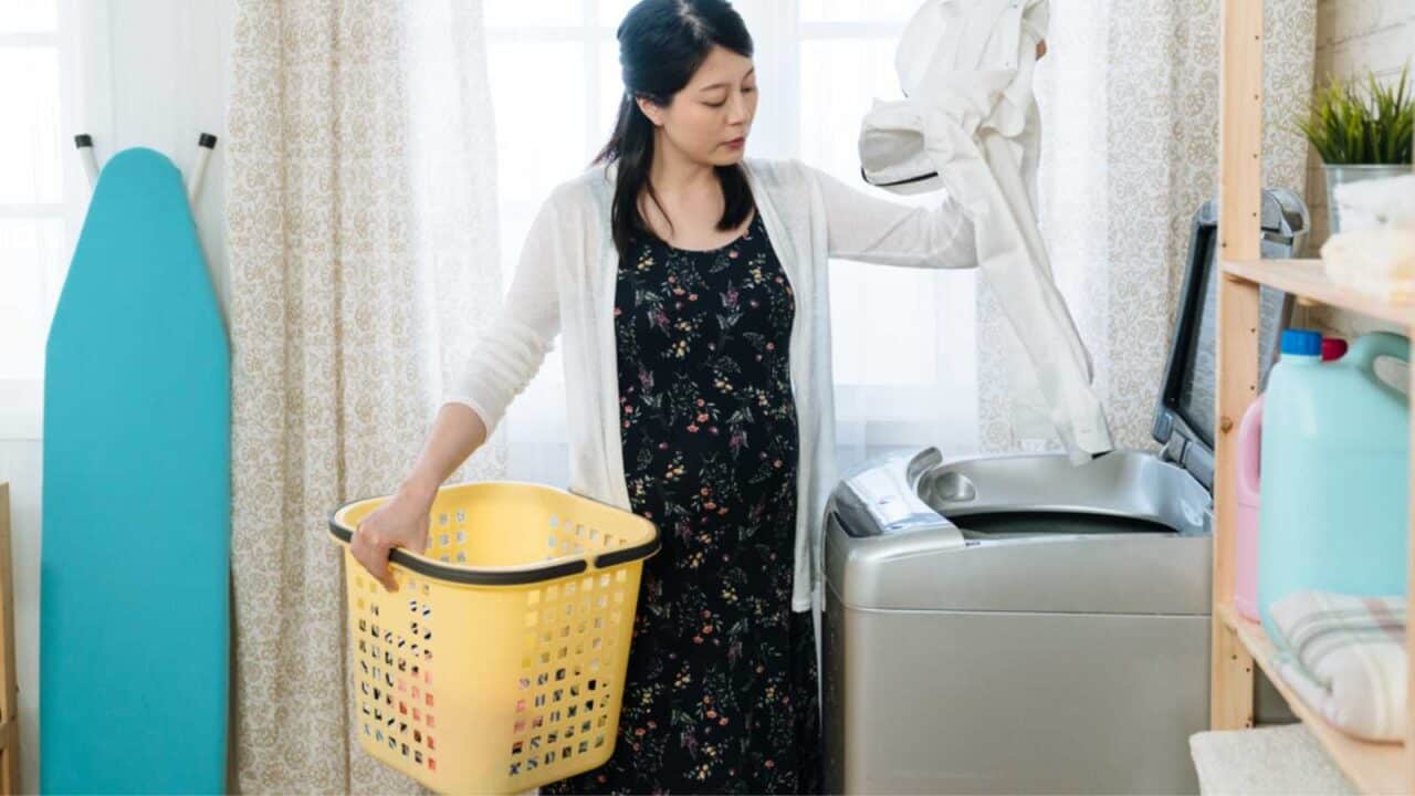 Woman using Laundry Basket