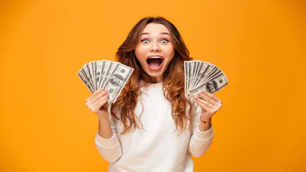 excited-woman-with-money