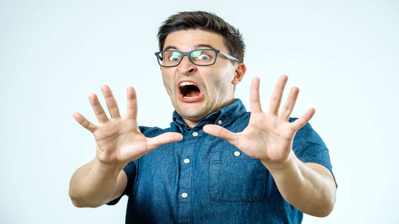 terrified man glasses