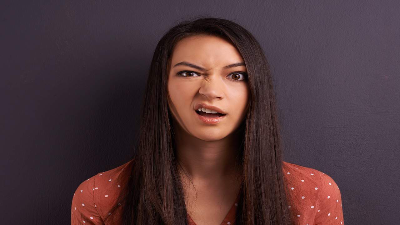 confused woman dark hair
