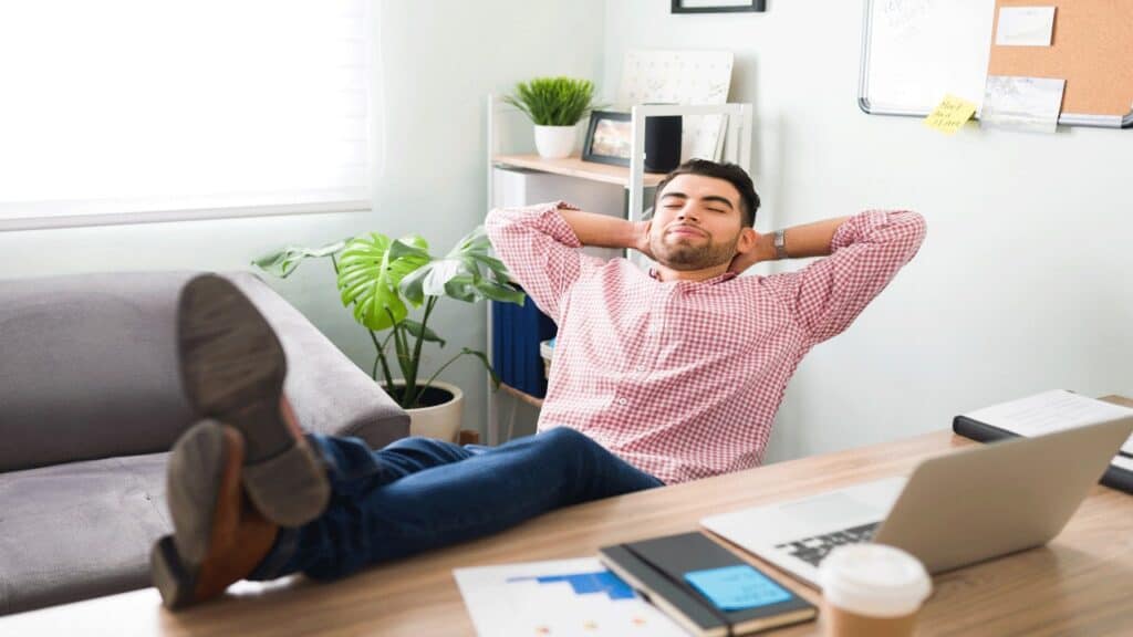 man-relaxing-at-desk