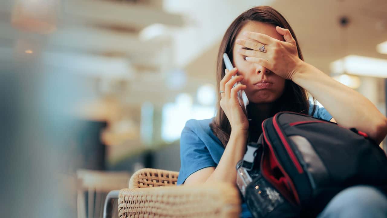 woman stressed on phone