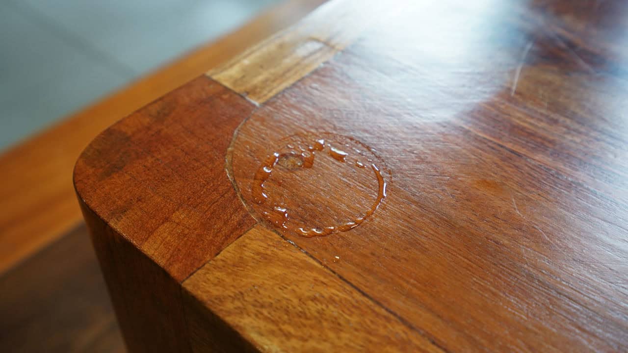 Stock Photo ID: 1348463228Close up Water ring on wooden tray table