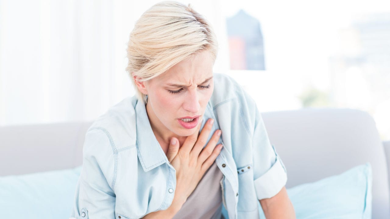 woman having breath difficulties