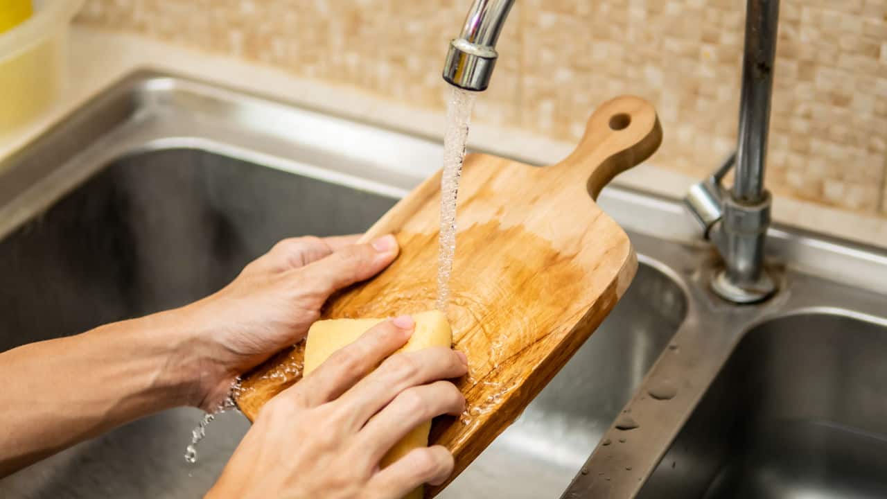 Cleaning and rinsing a cutting board
