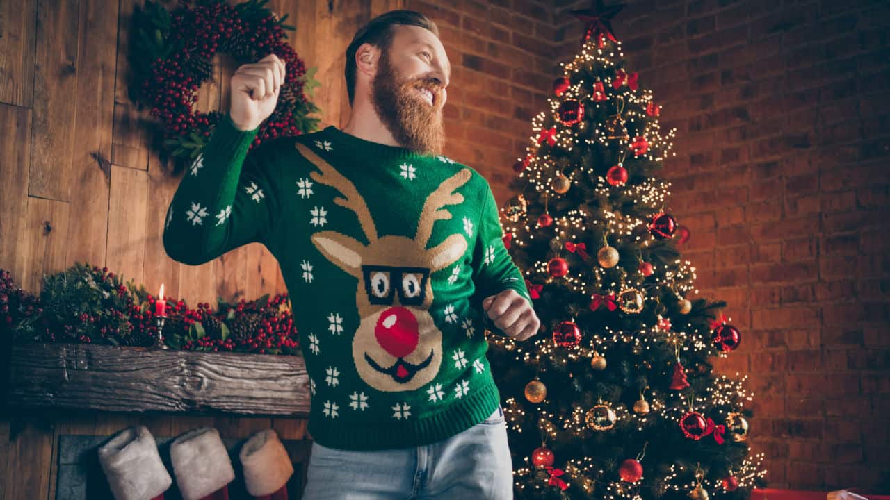 man in a Christmas sweater