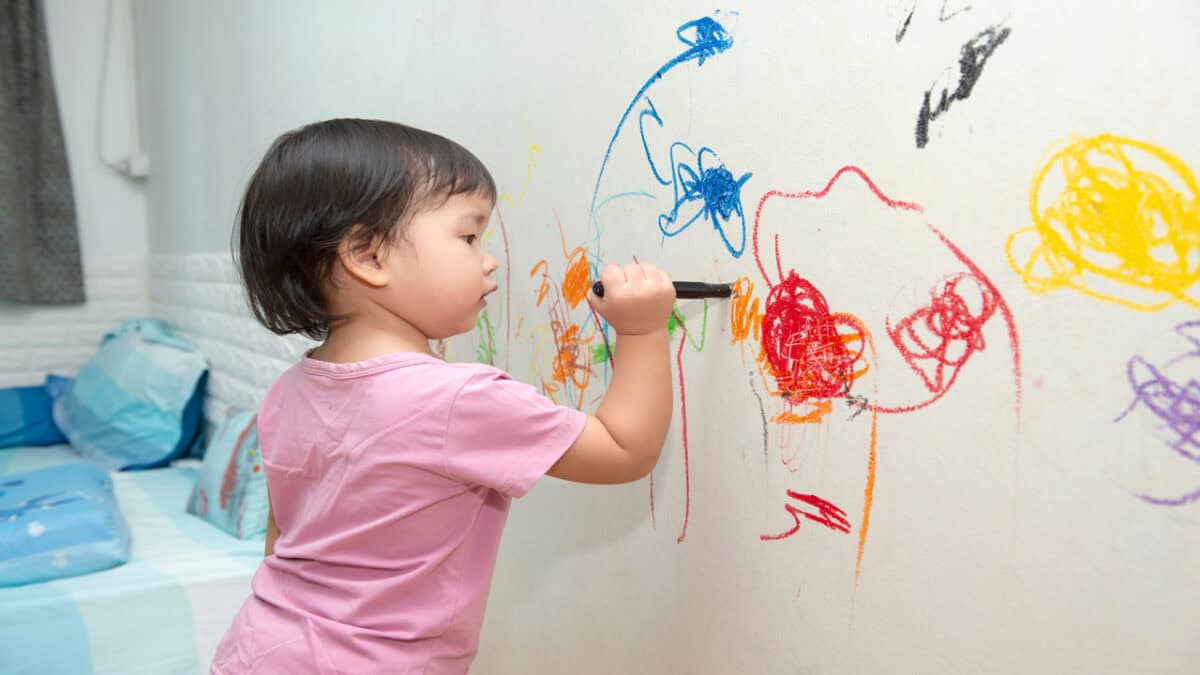 kid-drawing-on-wall