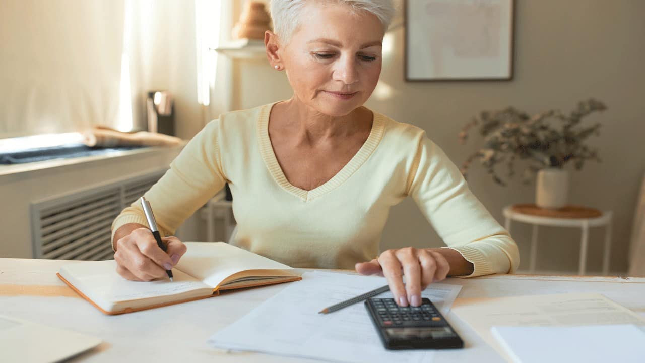 middle-age-woman-reviewing-finances