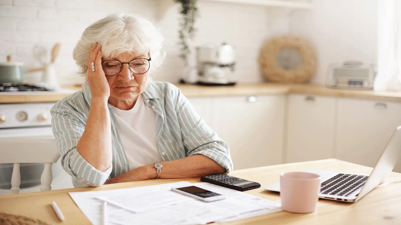 older-woman-stressed-financials