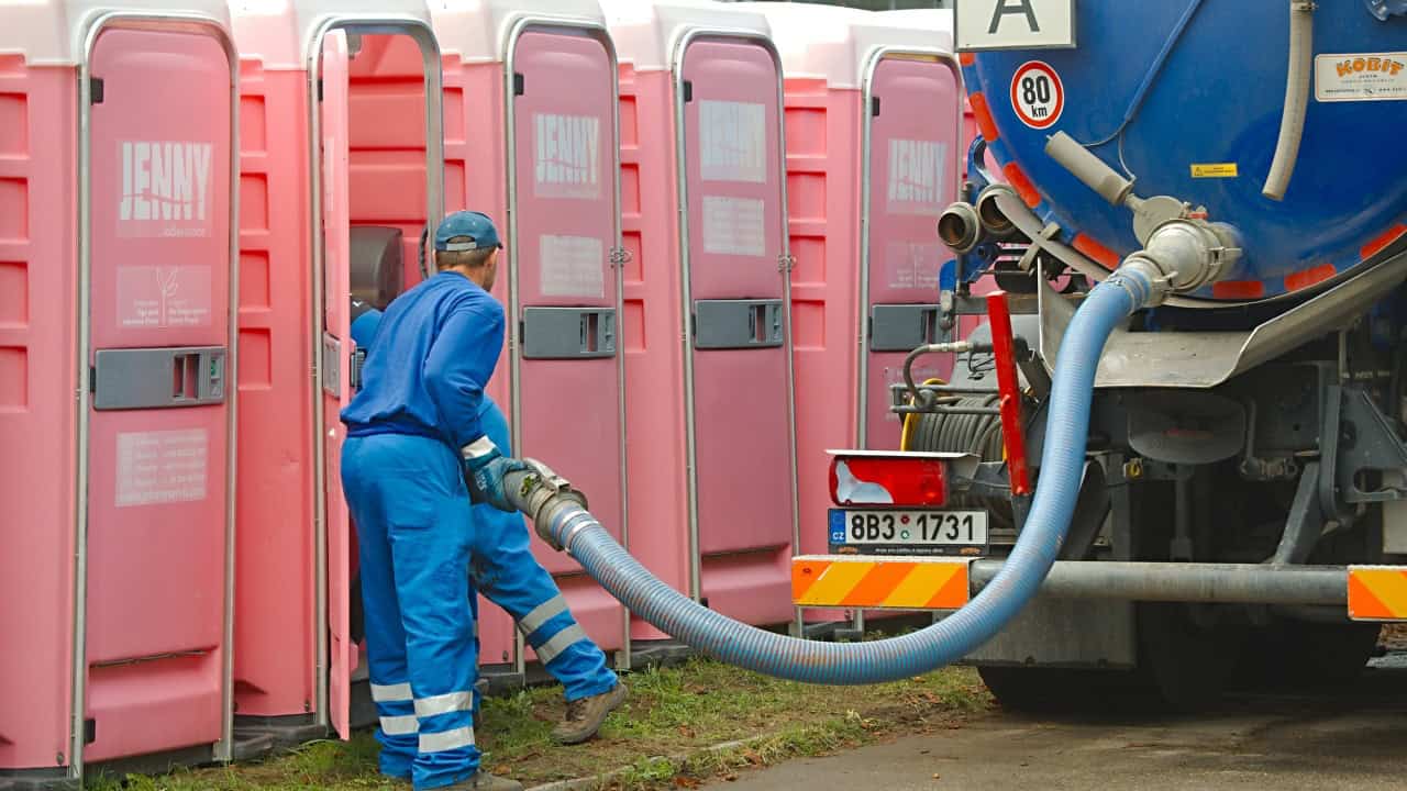 Portable Toilets Being Cleaned