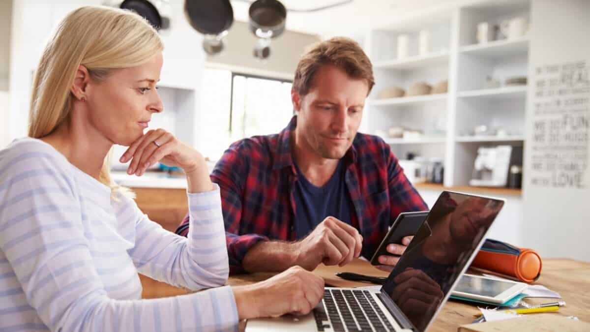 Couple using computers