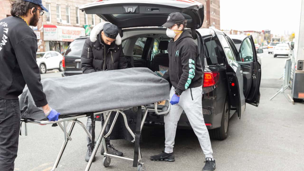 orkers of Al-Rayaan Funeral Home in Brooklyn where traditional Muslim rituals performed move dead body