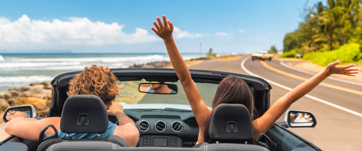 happy-couple-driving